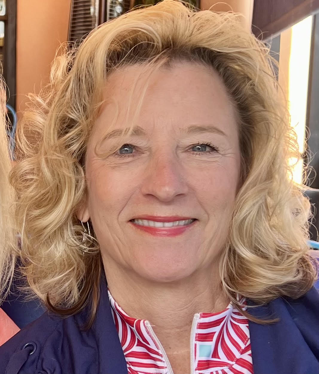 Sue Kempter-Miller smiling outdoors